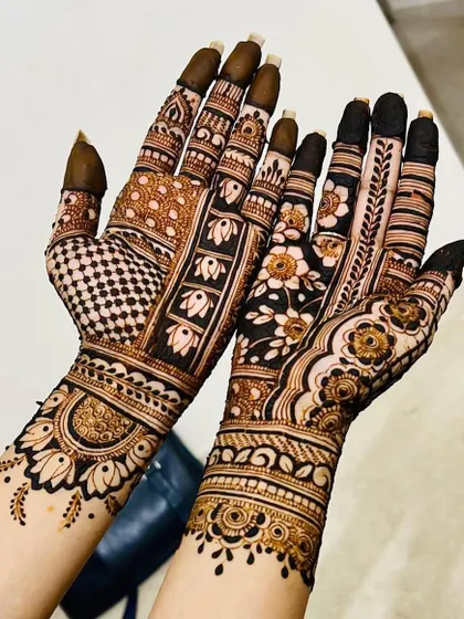 A view of both hands, showing the unique and artistic combination of different styles.