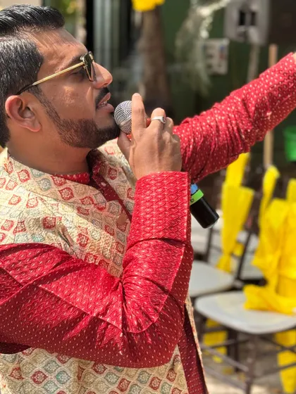 A close-up of me engaging the crowd. I aim to spread happiness in all directions.