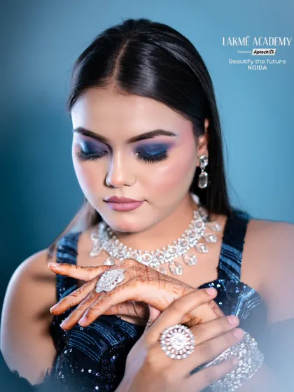 This detailed shot highlights the diamond jewelry and the perfectly blended blue eyeshadow. We teach how to coordinate makeup with accessories for a polished and complete look.
