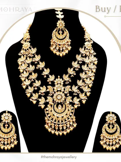 A graphic showcasing a magnificent gold-toned bridal set with intricate floral and crescent motifs, available to both buy and rent.