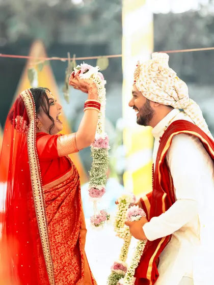 The fun and playful varmala ceremony, with the bride's makeup staying perfect through all the excitement.
