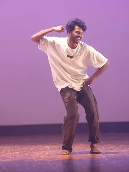 A moment of fun and confidence from an open-style performance. Our classes encourage students to find their own unique vibe and express themselves freely.