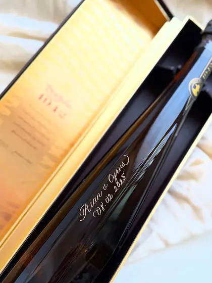 The iconic Don Julio 1942 bottle is an engraver's dream. This clean, elegant engraving for a wedding gift showcases how a personal touch can elevate a luxury product, making it a timeless and deeply meaningful present.
