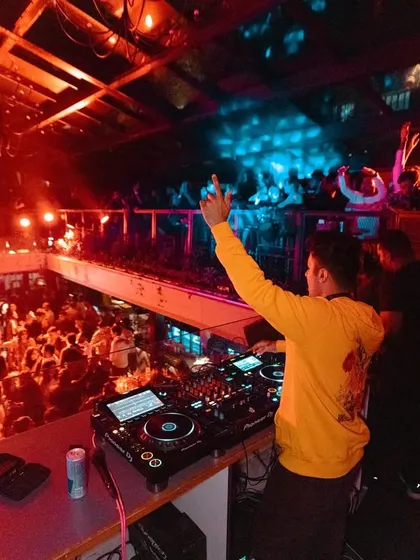 Snippets from our debut in Chennai. This high-angle shot shows a packed, two-level venue completely vibing to the music.