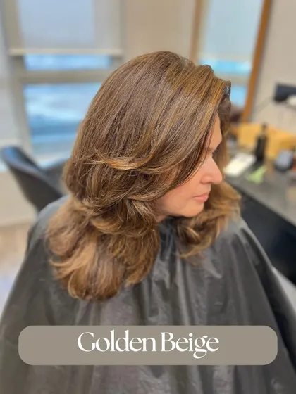 A beautiful Golden Beige balayage. The warm, sandy tones are perfect for a soft, sun-kissed look that complements warmer skin tones.