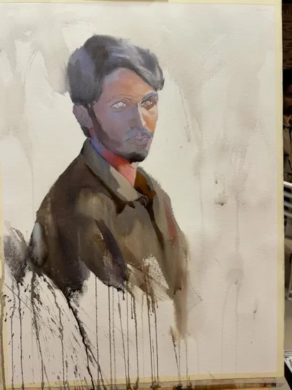 The portrait in an early stage, with the basic colours and tones blocked in. This is a crucial step in the watercolour process.