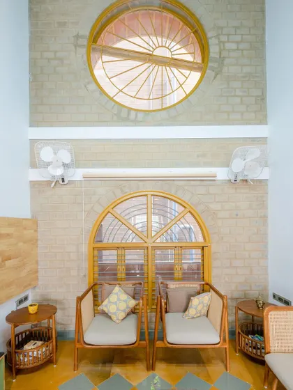 Another angle of the living room's high ceilings and large windows.