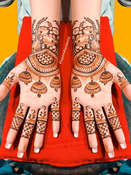I love creating unique motifs in my mehandi. This design features beautiful 'jhumka' (traditional earring) patterns, making it a creative and stylish choice for any party or function.