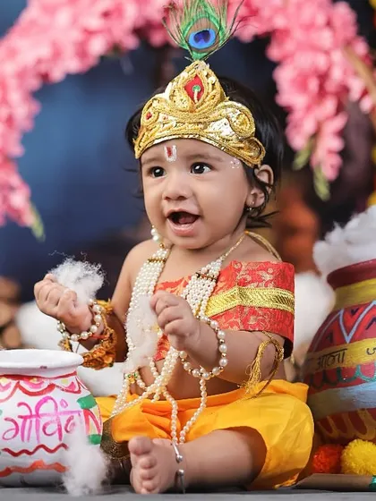 Capturing the playful side of 'Natkhat Kanha' as he sits with his pots of butter. The joy and innocence in his eyes are what make these shoots so magical.