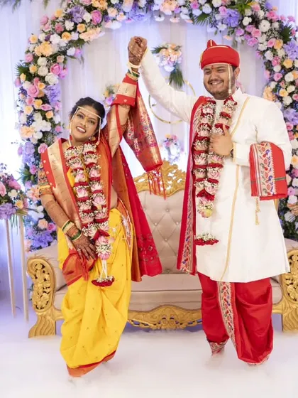 A celebratory moment on a cloud of smoke, this shot is full of energy and joy, marking the beginning of their new life together.