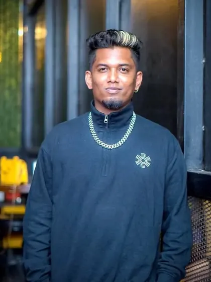A portrait shot showing my confident and composed look. As a DJ, presence is just as important as the playlist.