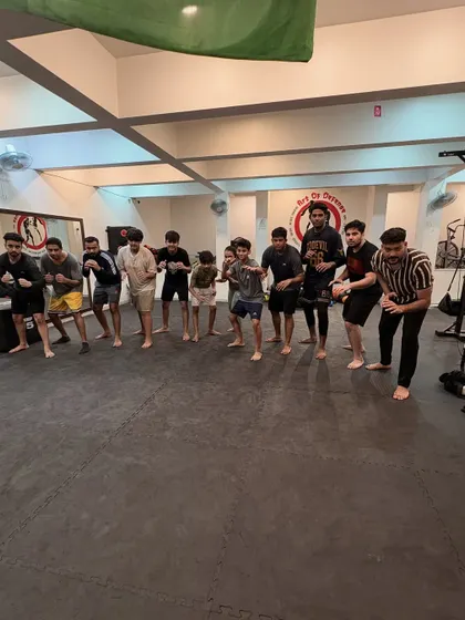 Different backgrounds, one mat, one mindset. Our community is built on mutual respect and the shared grind of martial arts training.