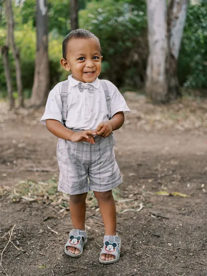 A portrait of a handsome two-year-old boy in the woods. I love capturing the spirit of toddlers as they explore their world.