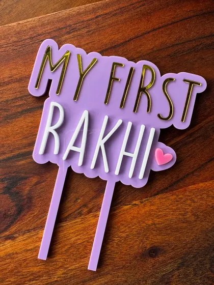Another look at the "My First Rakhi" topper, a sweet and modern way to celebrate this special sibling bond.