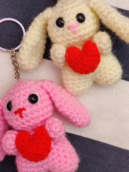 A photo dump of my Valentine's month keyrings, featuring these love-struck bunnies.