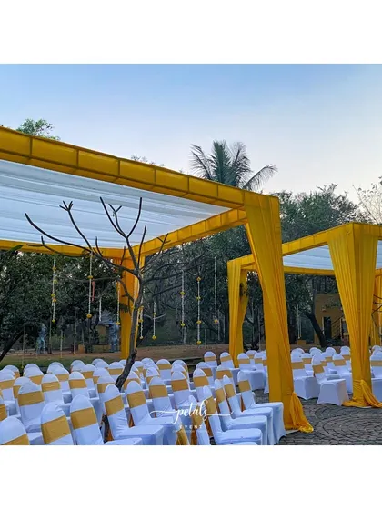 Guests are welcomed under beautiful fabric tents, adding charm and comfort to this elegant South Indian wedding.