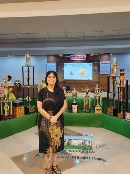 A nostalgic visit to my alma mater, Mithibai College, standing before the trophies we won. This visit reminded me of my early 'Tabla Storytelling' performances, which laid the foundation for concepts like 'Ramayan on Tabla'.