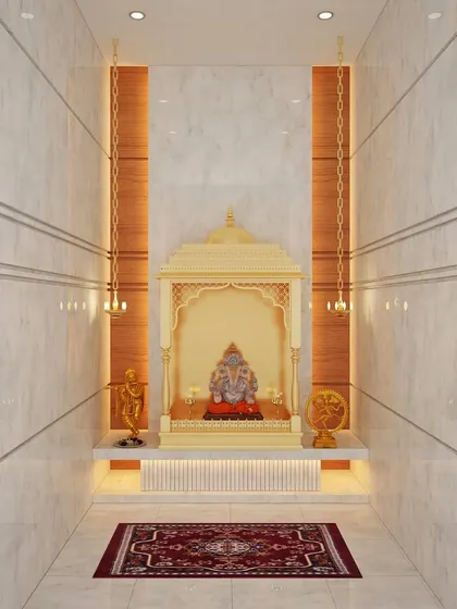 We brought the serene essence of traditional Indian temples into this penthouse pooja room. The design uses pristine white marble for the walls and floor, with warm wood accents and soft, focused lighting to create a peaceful and sacred space.