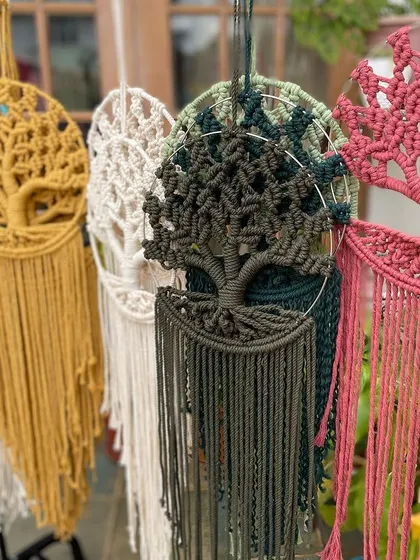 A side view of the Kalpavriksha collection, showing the different colors hanging together. From olive green and rust to bright turquoise, there's a color for every decor style.