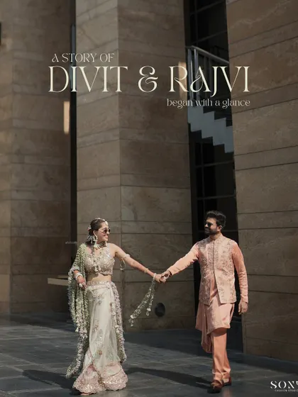 A "movie poster" style shot of the couple, hand-in-hand, against a modern architectural background, announcing the beginning of their story.