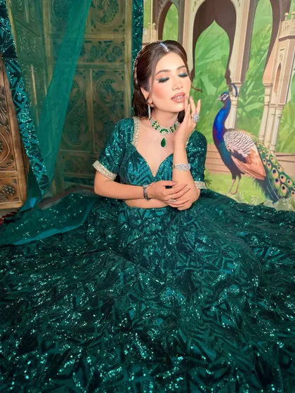 A dreamy, artistic shot. The makeup looks beautiful under different lighting, a testament to good technique.