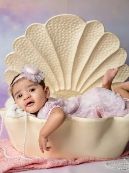 A little pearl in a shell of dreams. Our creative props add a touch of fairytale magic to your newborn's photos.