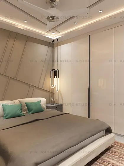 A bedroom with a minimal yet classy aesthetic, featuring a geometric-paneled accent wall and modern pendant lights.