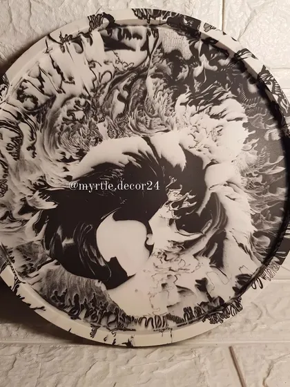 The bold, abstract pattern of this black and white tray makes it a true work of art.