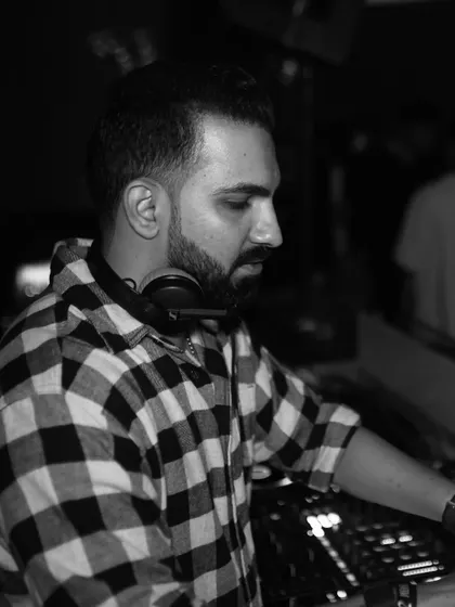 A black and white photo of me at the decks. The picture might be monochromatic, but the night was full of color.