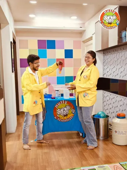 The joy of science! Our professors are captured mid-experiment, their smiles showing how much they love sharing their passion for science and making learning a blast for everyone.