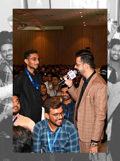 Interacting with an attendee at the HMS India Tour. Making a large conclave feel personal is one of my key skills.