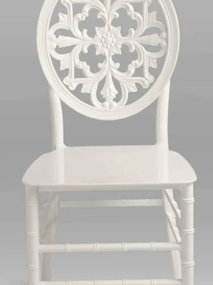 For a more elegant and decorative look, we offer banquet chairs like this white one with an ornate backrest. It's a popular choice for weddings and upscale events.