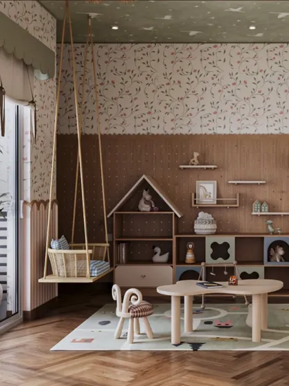 A gentle swing provides a perfect spot for reading or daydreaming. Positioned next to the custom wooden storage unit, this corner balances active play with moments of quiet reflection, all within a cohesive design language of natural wood and soft pastels.