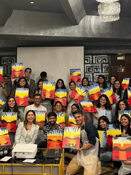 This is just one of three workshops we hosted simultaneously across three different cities for a corporate client. It was a logistical challenge but so rewarding to see all the happy faces and finished paintings.