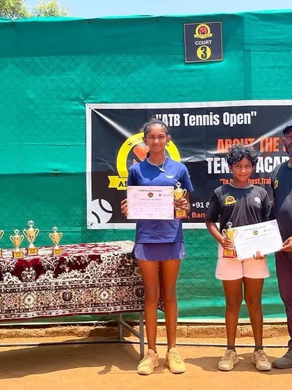 The girls' singles winner and finalist of the CS 7 U-12 AITA tournament held at our academy.