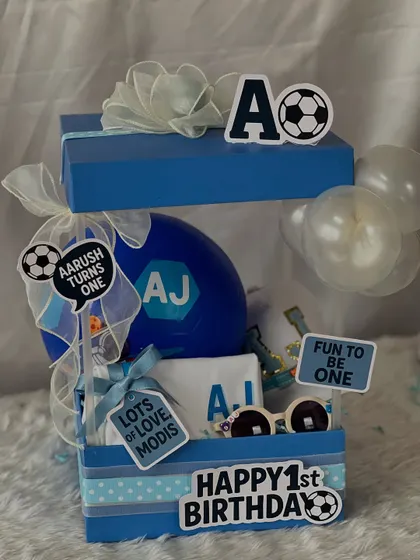 Another angle of the sporty and stylish football-themed birthday hamper. The blue and white color scheme with football details makes it a perfect gift for a little champion.