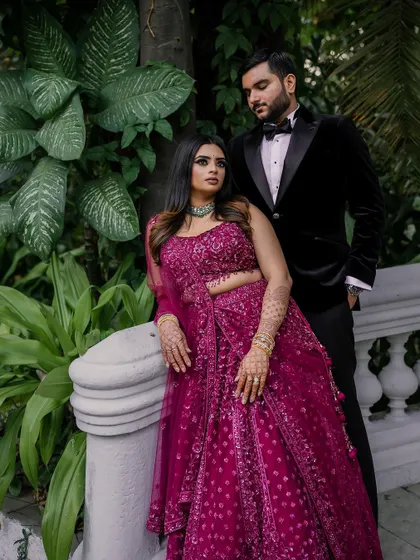 A stunning reception look at the Taj Westend. We use dramatic lighting and elegant backdrops to create sophisticated and timeless portraits for your evening events.