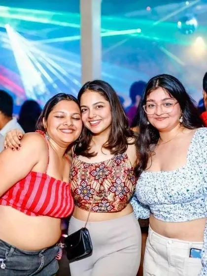 Friends enjoying the music and the vibrant atmosphere. My goal is to create a space where people can connect and have fun.