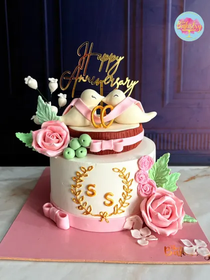 A full view of the romantic lovebird anniversary cake, perfect for celebrating a special milestone.