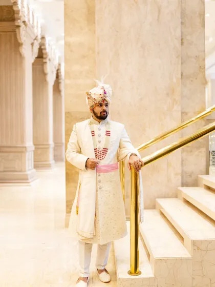 We had just 15 minutes for groom portraits, and Aakash nailed it. He looks so poised and regal in his ivory sherwani on the grand staircase of the Sheraton.