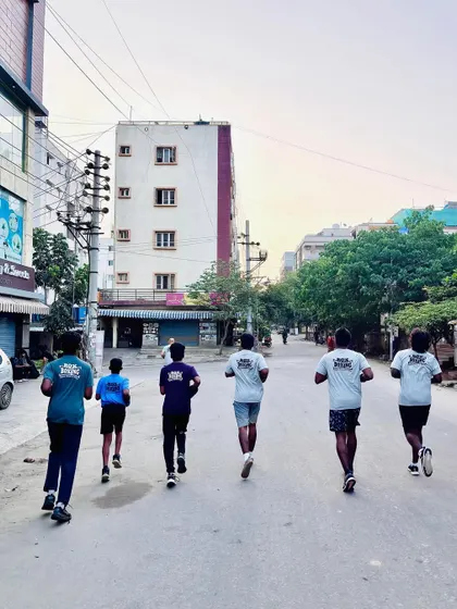 Taking the training to the streets. Our team on an outdoor run to build cardiovascular endurance, a critical component of a boxer's conditioning.