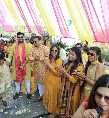 Leading the guests in a dance train at a Haldi ceremony. It's one of my favourite ways to get everyone moving together.