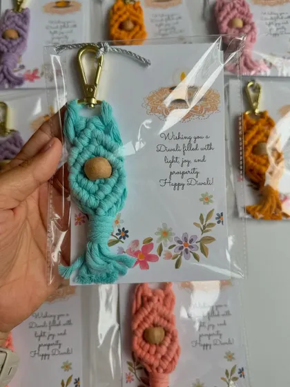 This bright turquoise keychain adds a beautiful pop of color. It was part of a mixed set of Diwali favors, allowing the host to give a unique gift to each guest.