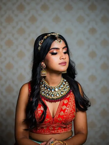 A serene and elegant portrait. The focus is on the soft, blended eyeshadow and the overall calm and composed demeanor of the bride.