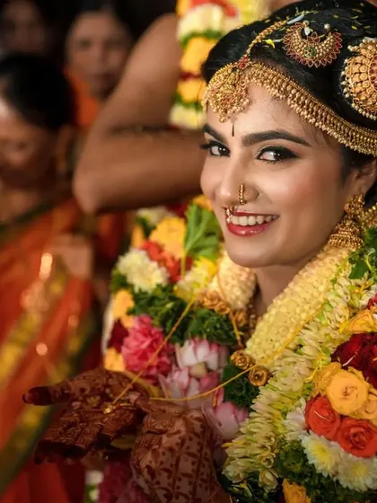 A duplicate of 17, a beautiful portrait of a smiling South Indian bride.