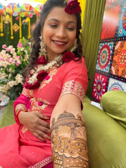 My lovely bride Arpita, showing off her beautiful arm mehndi.