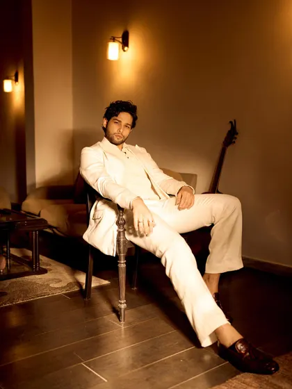Siddhant Chaturvedi in an all-white suit for Grazia's Fashion NXT event. This look is about clean lines and monochrome elegance, proving that white can be just as powerful as black for formalwear.