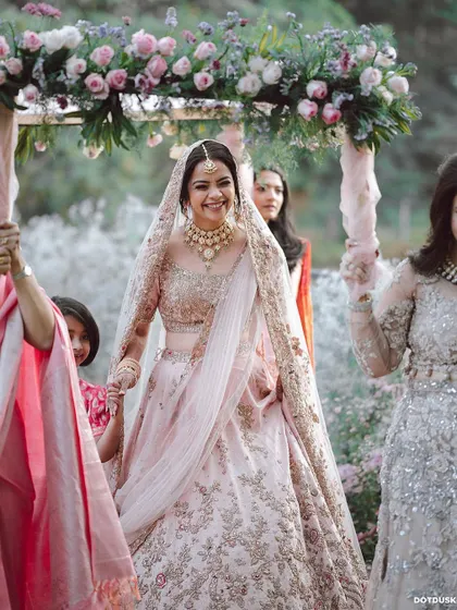 The beautiful bride making her entrance. This moment is the culmination of months of planning and hard work, and seeing the smiles on our clients' faces makes it all worthwhile.