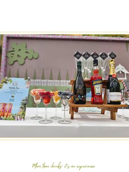 Our Bubbly Bar, ready for service. This concept features a selection of sparkling wines, champagne, and fresh fruit purees for guests to create their own custom bellinis and mimosas.