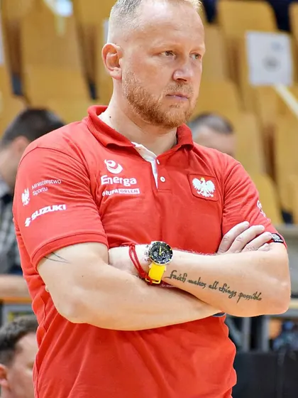 An image of Coach Maros Kovacik, whose tattoo reads "Faith makes all things possible." He brings not only technical skill but also a powerful mindset to his coaching.